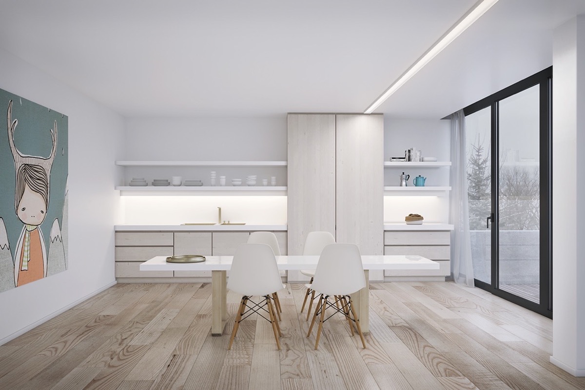 Sàn phòng ăn được lót ván gỗ với đường vân rất tự nhiên, kết hợp với sắc trắng của nền tường và hệ thống kệ mở. Bên cạnh đó, ánh sáng nhẹ nhàng từ khu vực backplash càng làm nó thêm quyến rũ.